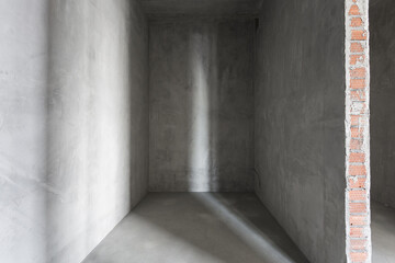 interior of the apartment without decoration in gray colors. rough finish