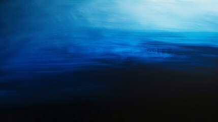 Obraz premium A gradient from blue to black background