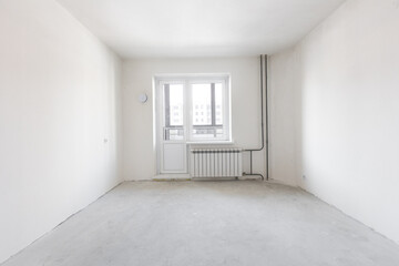 interior of the apartment without decoration in gray colors. rough finish