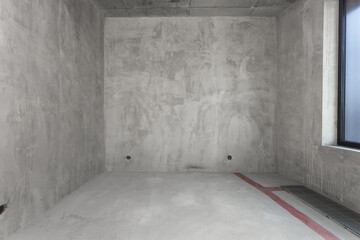 interior of the apartment without decoration in gray colors. rough finish