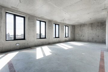 interior of the apartment without decoration in gray colors. rough finish