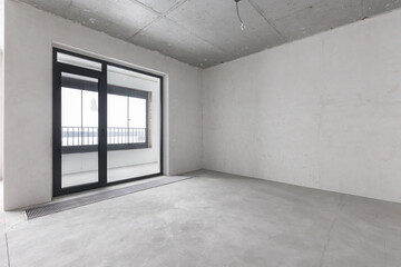 interior of the apartment without decoration in gray colors. rough finish