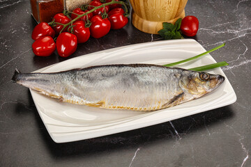 Whole raw salted herring fish