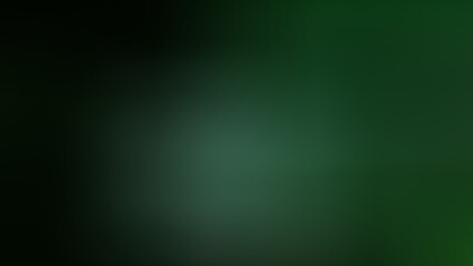 Dark green gradient of abstract background. Close-up green gradient texture for wallpaper, card, prints, and design. Gradient background with concept of abstract, nature and mystery. Green background.