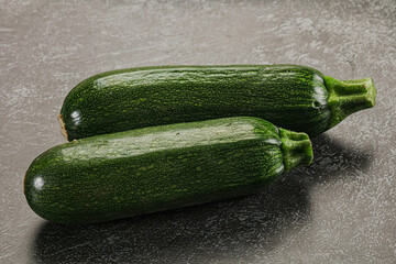 Raw green ripe zucchini vegetable
