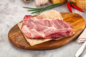 Raw pork neck steak for grill