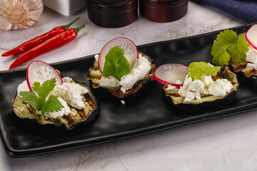 Grilled eggplant with cheese and radish