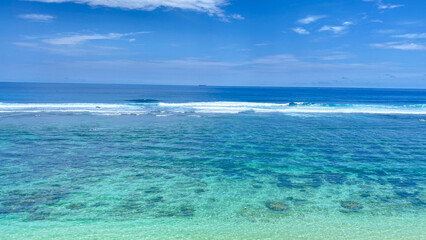 beautiful beach with blue sky and white clouds