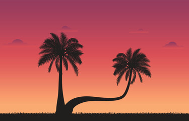 Dark palm trees silhouettes on colorful tropical sunset background