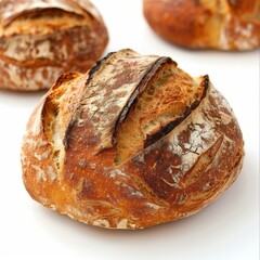 A close-up image of a boule of sourdough bread