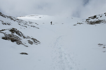 Difficult hike in the snow in the Abruzzo mountains, Italy