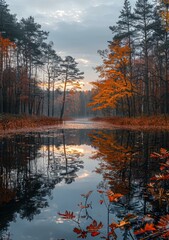 Fototapeta premium Colorful autumn trees and their reflection in the water