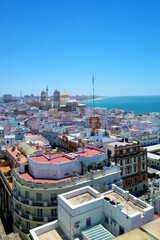 Panoramic view of old city Cadiz, Spain. Aerial cityscape of rooftops and Cathedral de Santa Cruz....