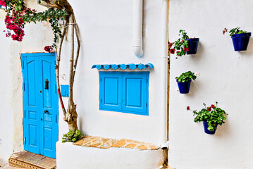 Typical white house with blue door in the beautiful city of Mojacar, Almería, Andalusia	