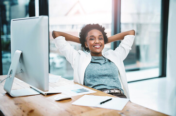 African woman, relax and stretching at office desk for confidence and happy with graphs, stats and results. Portrait of public relations worker on computer with business charts and startup increase © peopleimages.com