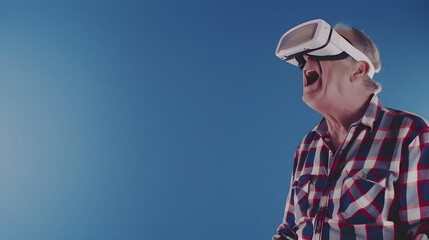 Older, mature man wearing virtual reality (VR) goggles. Light background. Space for copy.