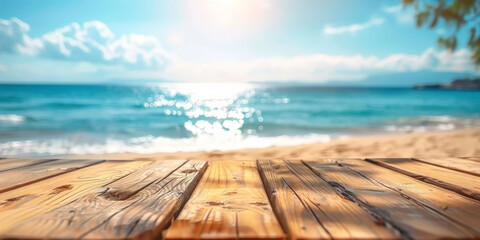 Fototapeta premium Empty wooden table top with blurred beach background for product display, vacation and travel concept. summer banner template.