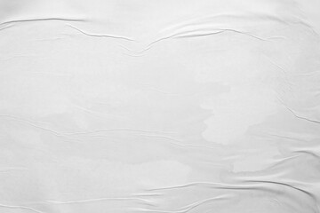 white crumpled and creased glued wrinkled paper poster texture background