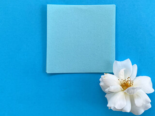 Blue paper background for copy space. Stock photo.