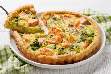 Homemade pie with salmon and broccoli