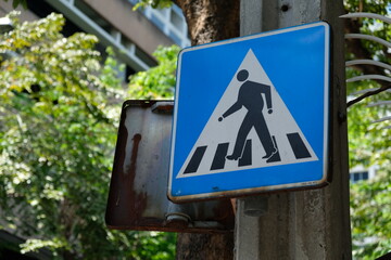 Focus on zebra crossing sign.