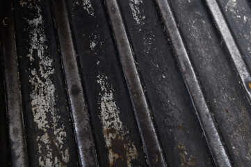 Old black corrugated metal texture surface