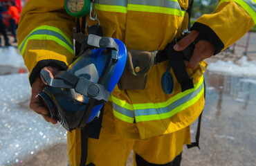 Firefighters practice building fire response plans using foam.