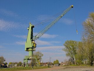  Old industrial harbour crane in Kapitein Zepos park in Dok Noord, city development area in Ghent, Flanders, Belgium 