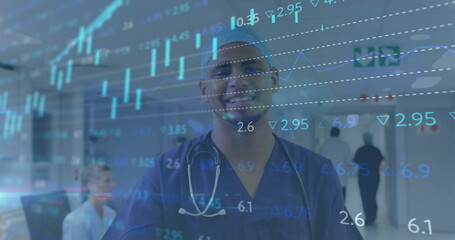 Image of financial data processing over caucasian male surgeon in hospital