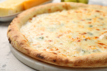Delicious cheese pizza on table, closeup view