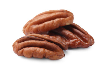 Three tasty pecan nuts isolated on white