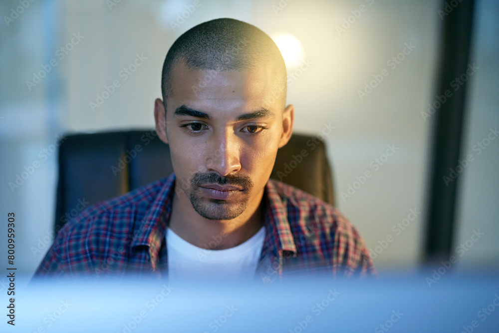 Aufkleber Computer, face and serious with developer man in office for coding, programming or web design. Internet, software and technology with confident programmer reading source code in workplace at night