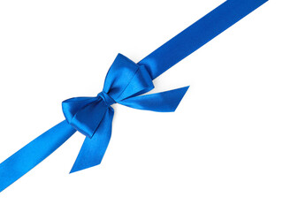 Blue satin ribbon with bow on white background, top view