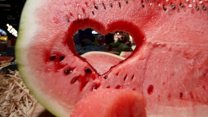 On the table of the gastromarket, merchants offer fresh and ripe watermelons, which attract the attention of visitors with their bright and appetizing appearance.