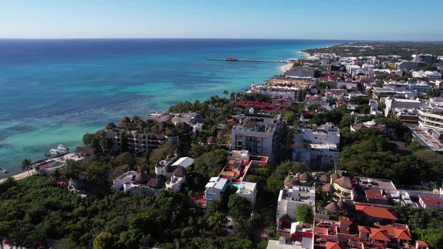 Playa Del Carmen, Mexico. Establishing Drone Shot of Waterfront Buildings and Caribbean Sea