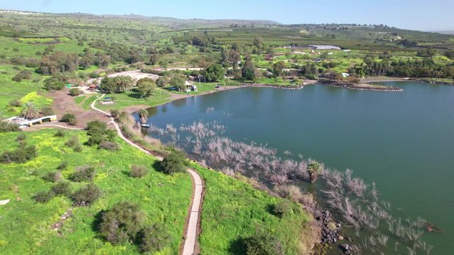 Drone shot of a tourist beach in the Sea of Galilee.