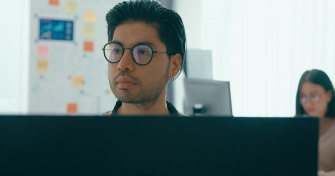 Closeup Adult Asia male freelance typing write prompt AI bot IT app smart program nomad, video game, terminal with coding language, user interface, designer, big data center on desktop computer.