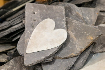 white heart on slate stones