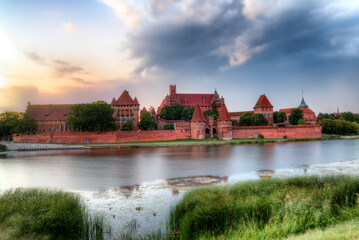 Gothic castle in Malbork at sunrise, Poland.