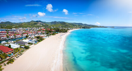 Panoramic aerial view of the beautiful Jolly Beach at the Caribbean island of Antigua and Barbuda