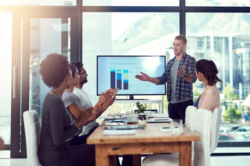 Diversity, teamwork and presentation in workplace for collaboration, project and leadership. Men, women and business meeting in office for workshop, training and data analysis for startup company