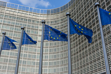Fluttering European Union flags in a row in Brussels, Belgium. Close up
