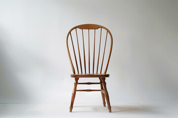 Elegant Windsor chair featured on a clean white backdrop.