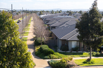 A row of new and modern residential suburban houses in a new developed estate in a Melbourne’s...