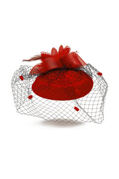 Close-up shot of a red felt pillbox hat with a veil decorated with volume flower, beads and feathers. The hat with an alligator clip is isolated on a white background. Front view.
