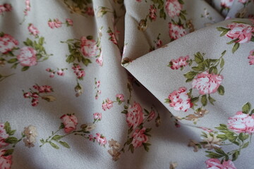 Crumpled grey rayon fabric with old-fashioned floral print