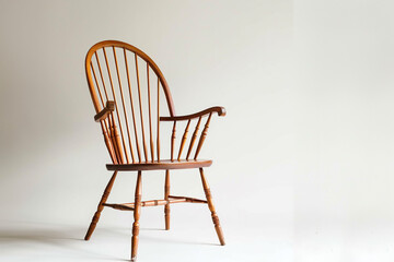Stylish Windsor chair captured with a clean white background.