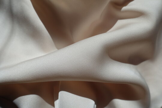 Crumpled simple unprinted light beige rayon fabric