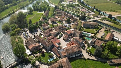 Beautiful little village aerial view of the mill village of Borghetto sul Mincio in the south of...