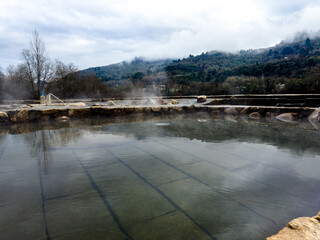 Steaming Outdoor Hot Spring with Mountain View